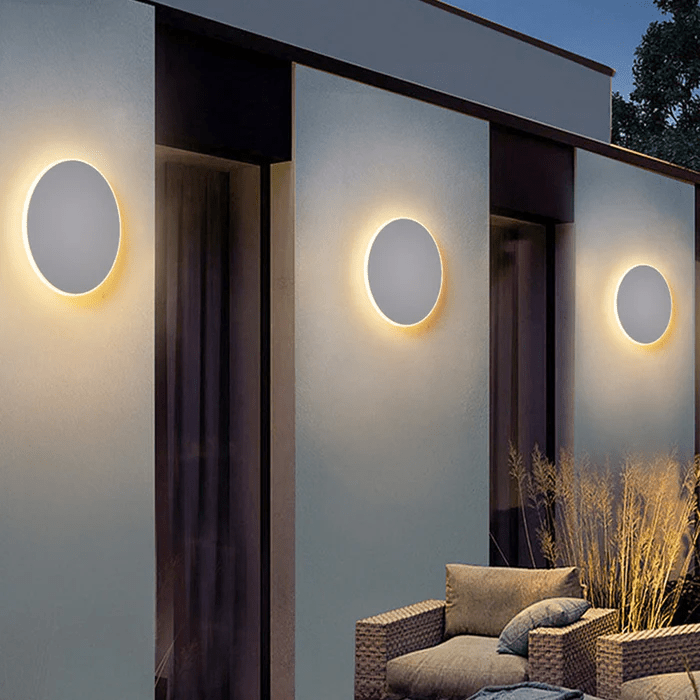 Minimalistyczna okrągła lampa LED ścienna z metalu do użytku zewnętrznego