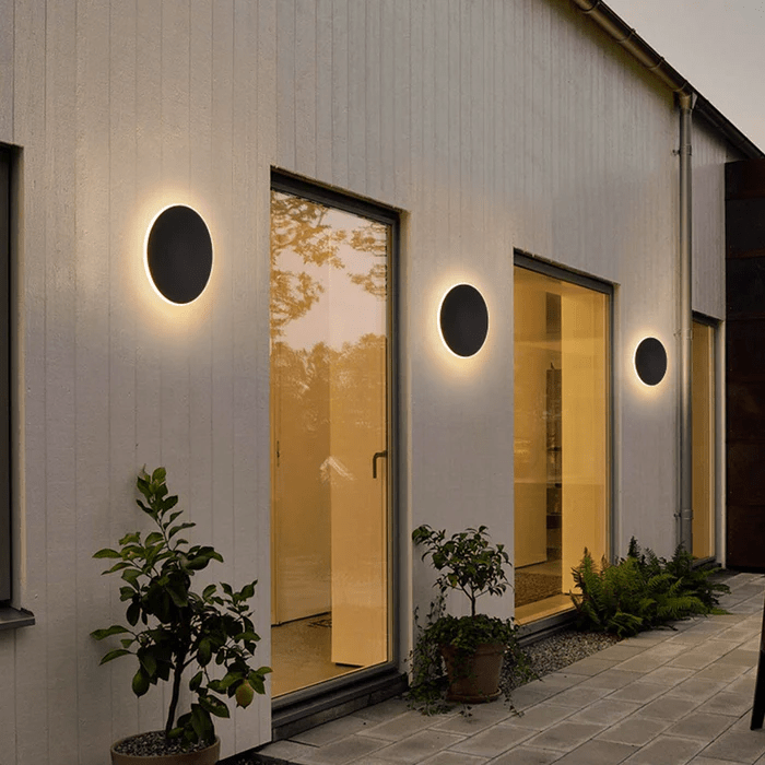 Minimalistyczna okrągła lampa LED ścienna z metalu do użytku zewnętrznego